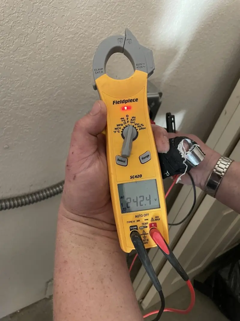 Voltage testing with clamp meter during Hot Tub / Pool Electrical Wiring in Forsyth